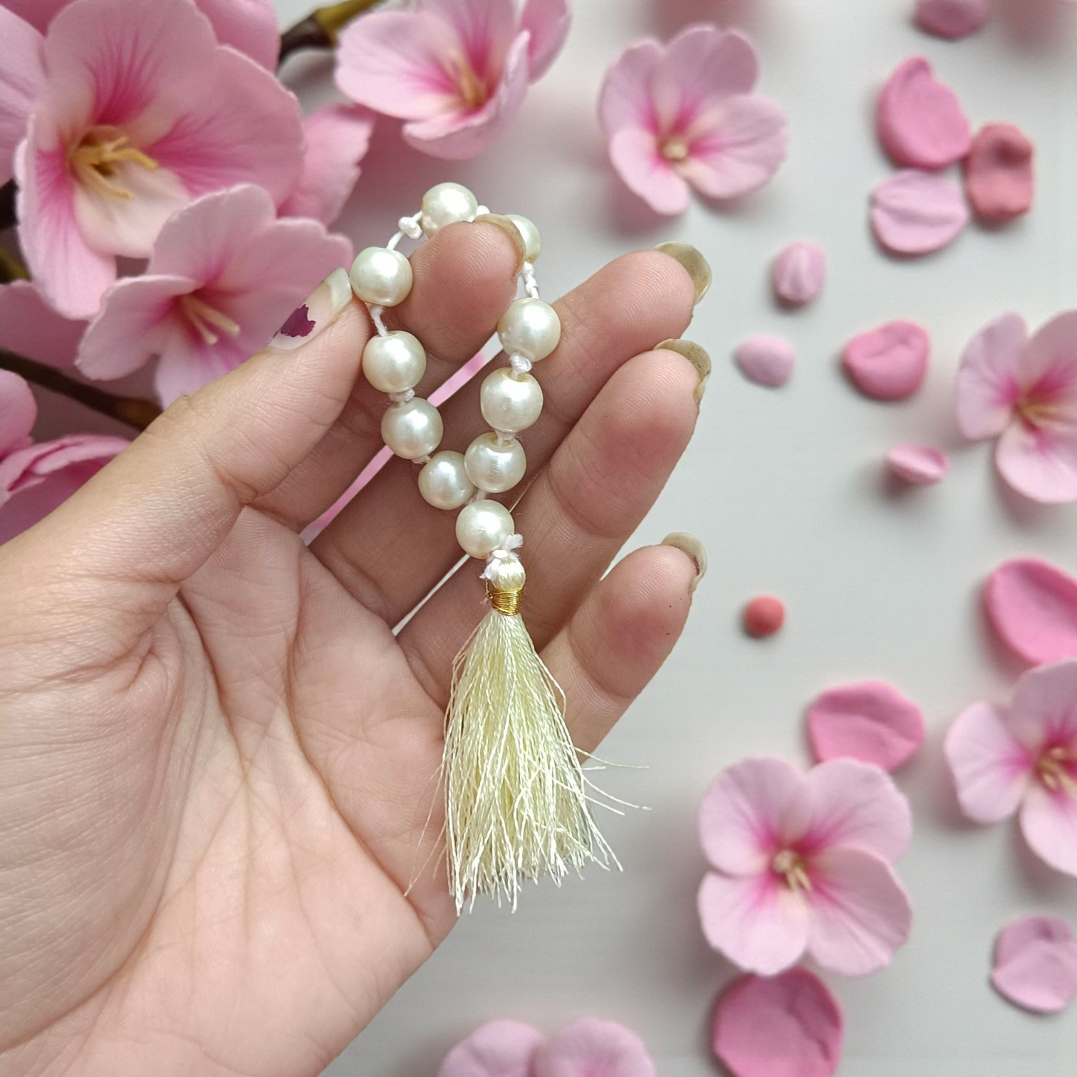 Image of a Natural Pearl Finger Mala with 9+1 lab-certified Moti beads, designed for meditation, peace, and emotional healing