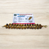 Image of a Natural Tiger Eye Bracelet made with polished 7mm lab-certified beads, designed for attracting good luck, wealth, and spiritual protection