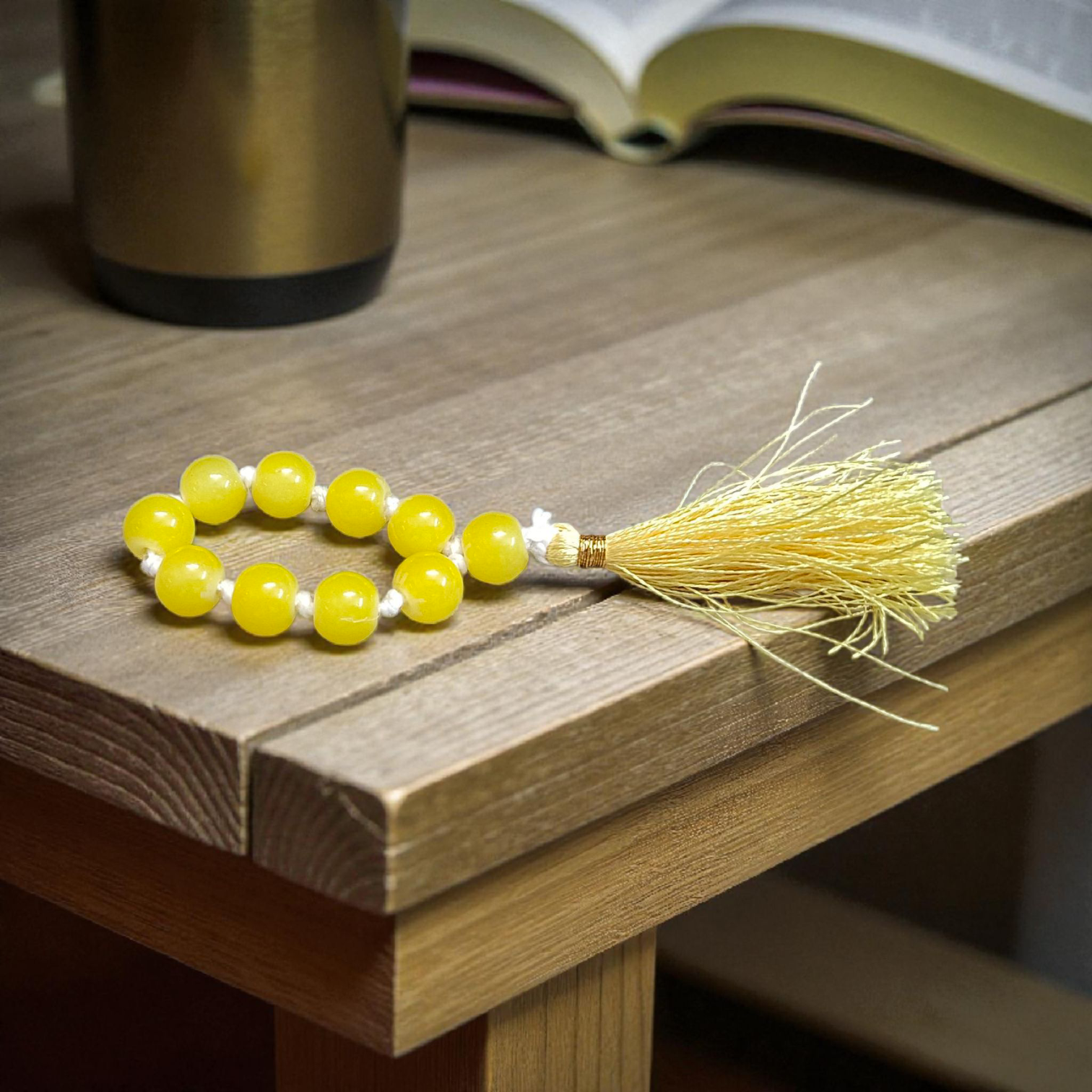 Image of a Natural Yellow Agate Finger Mala with 9+1 lab-certified yellow Hakik beads, beautifully handcrafted for meditation and healing