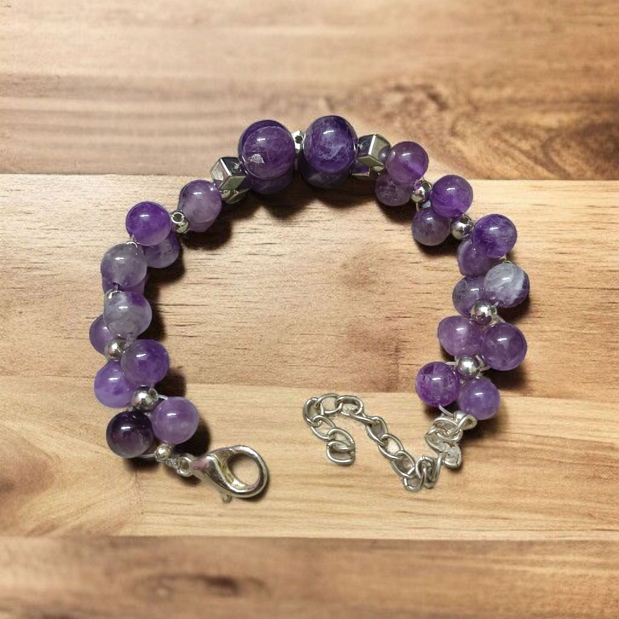 Image of a lab-certified Natural Amethyst Bracelet with polished 8mm beads, designed for emotional healing, sleep improvement, and spiritual protection