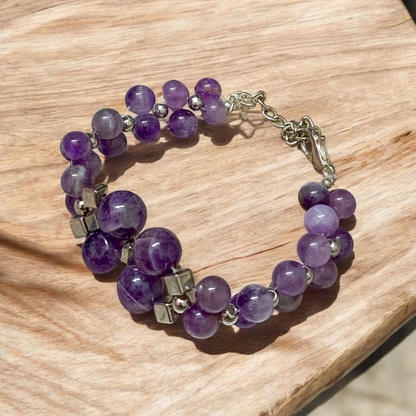 Image of a lab-certified Natural Amethyst Bracelet with polished 8mm beads, designed for emotional healing, sleep improvement, and spiritual protection