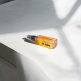 Image showing the sleek, elegant 25 ml Shri Shyam Spray Attar bottle, with a floral fragrance.