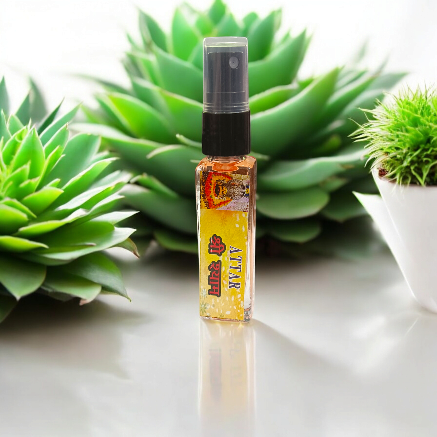 Image showing the sleek, elegant 25 ml Shri Shyam Spray Attar bottle, with a floral fragrance.