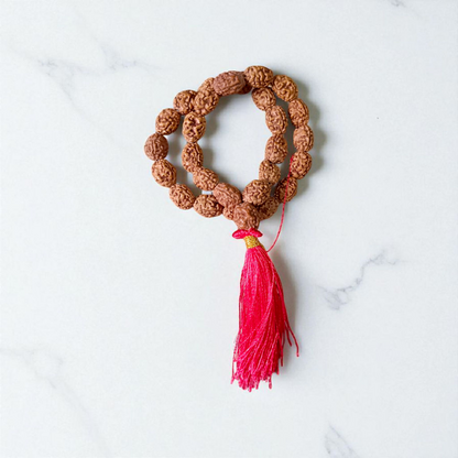 Lab-certified 3 Mukhi Rudraksha Mala for stress and anxiety relief, available in 27+1 and 108+1 bead variants, by Gurupujan