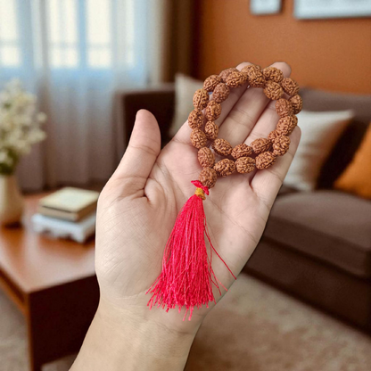 Lab-certified 3 Mukhi Rudraksha Mala for stress and anxiety relief, available in 27+1 and 108+1 bead variants, by Gurupujan