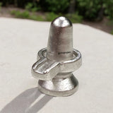Lab-certified Parad Shivling made from pure mercury, available in various sizes, ideal for spiritual growth and divine blessings by Gurupujan.