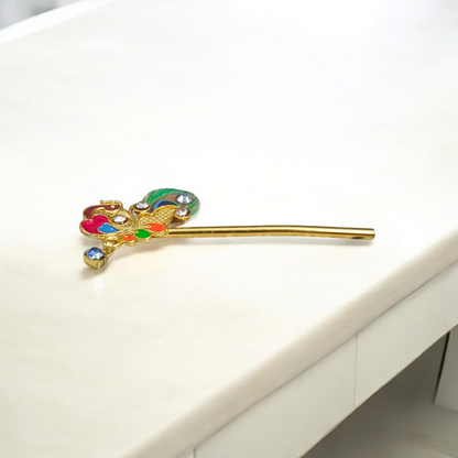 Laddu Gopal Bansuri with a peacock design and zircon embellishments, ideal for festival celebrations like Janmashtami.