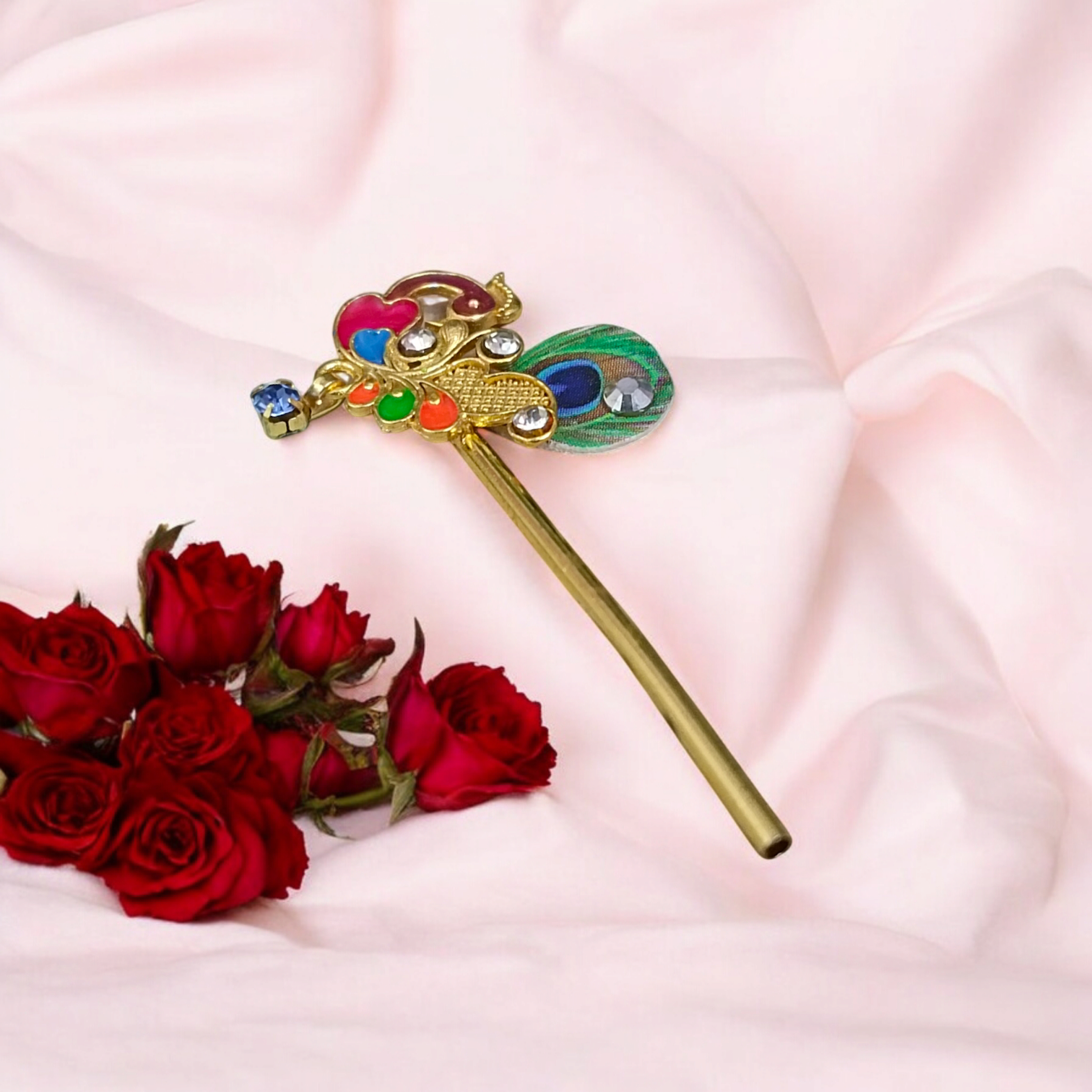 Laddu Gopal Bansuri with a peacock design and zircon embellishments, ideal for festival celebrations like Janmashtami.