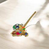 Laddu Gopal Bansuri with a peacock design and zircon embellishments, ideal for festival celebrations like Janmashtami.
