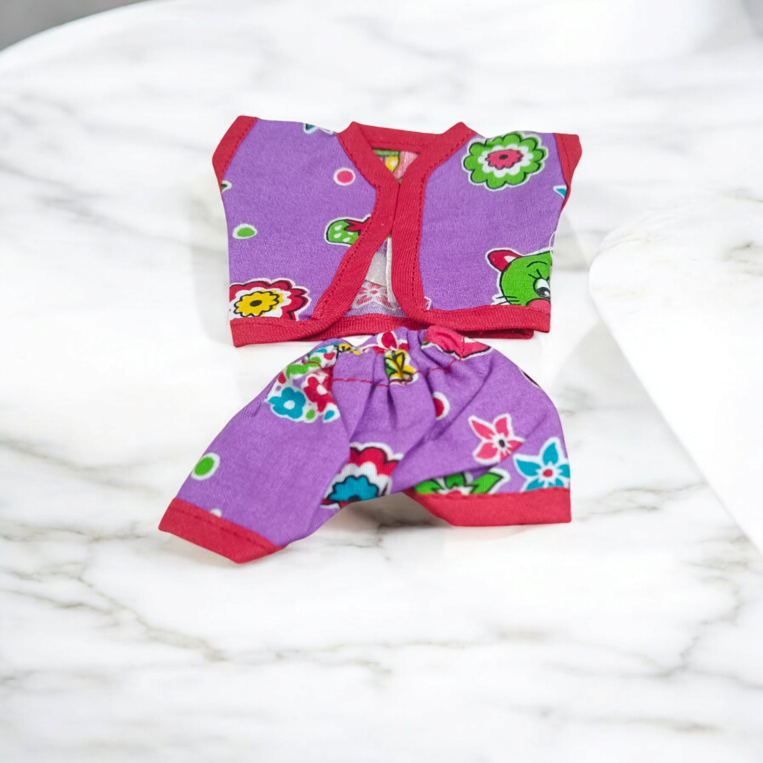 Laddu Gopal Ji dressed in soft cotton night suits, colorful and elegant design