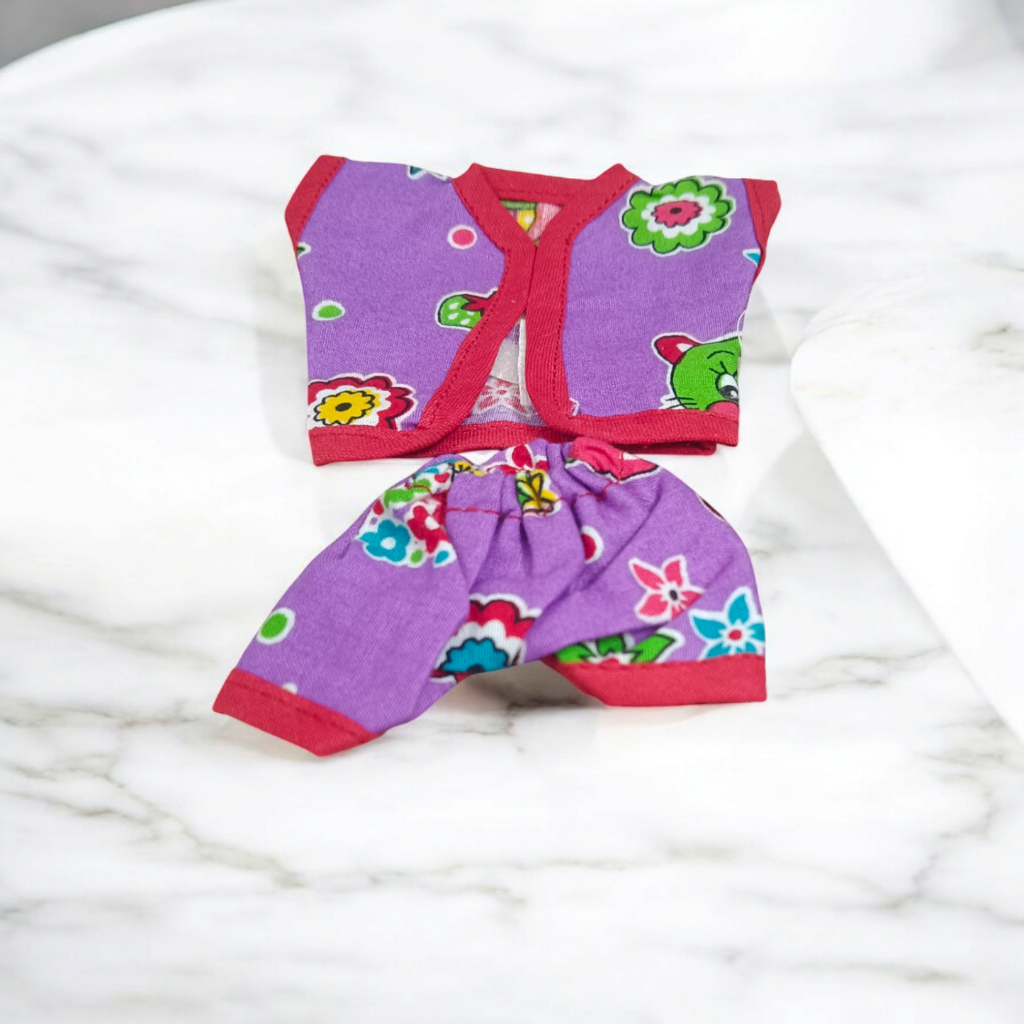 Laddu Gopal Ji dressed in soft cotton night suits, colorful and elegant design