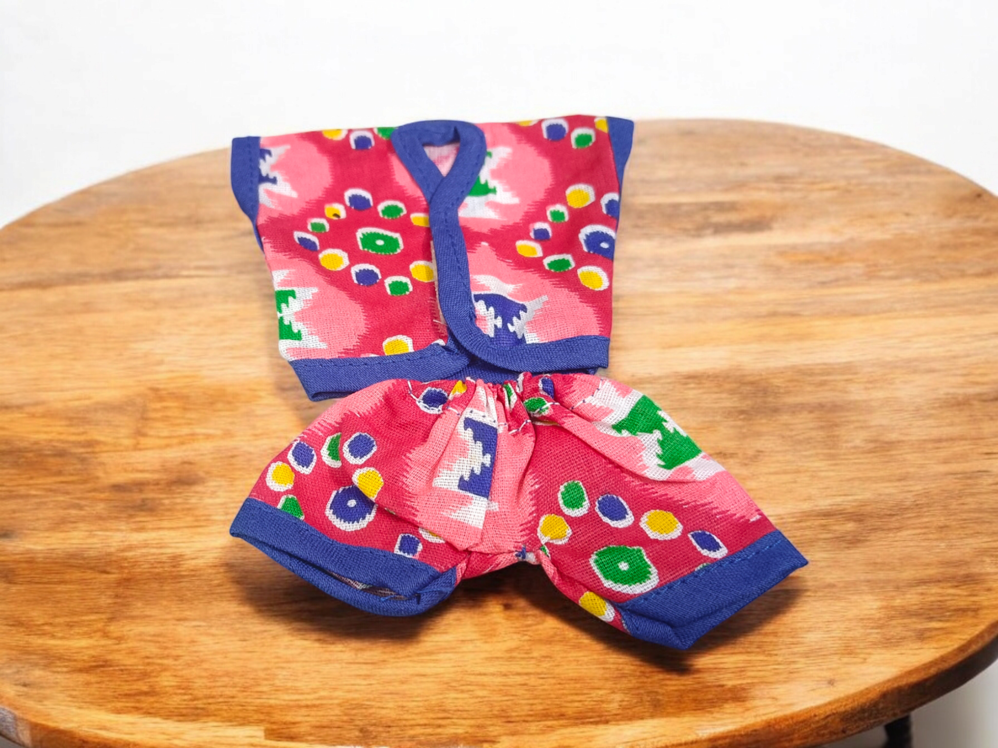Laddu Gopal Ji dressed in soft cotton night suits, colorful and elegant design