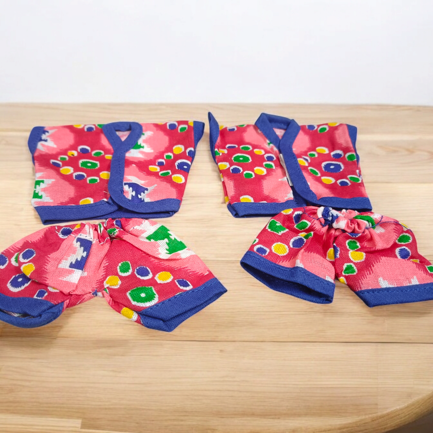 Laddu Gopal Ji dressed in soft cotton night suits, colorful and elegant design