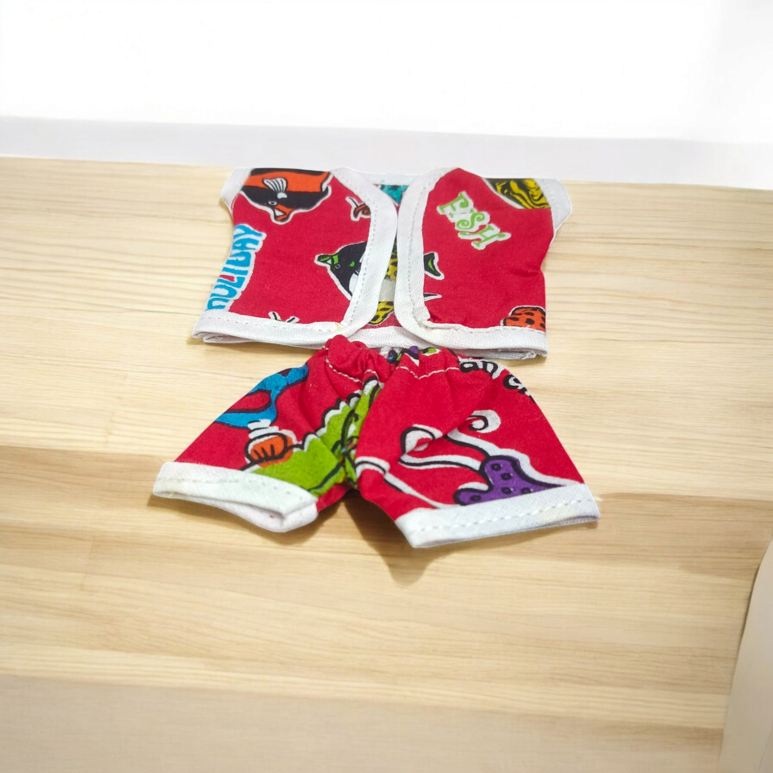 Laddu Gopal Ji dressed in soft cotton night suits, colorful and elegant design