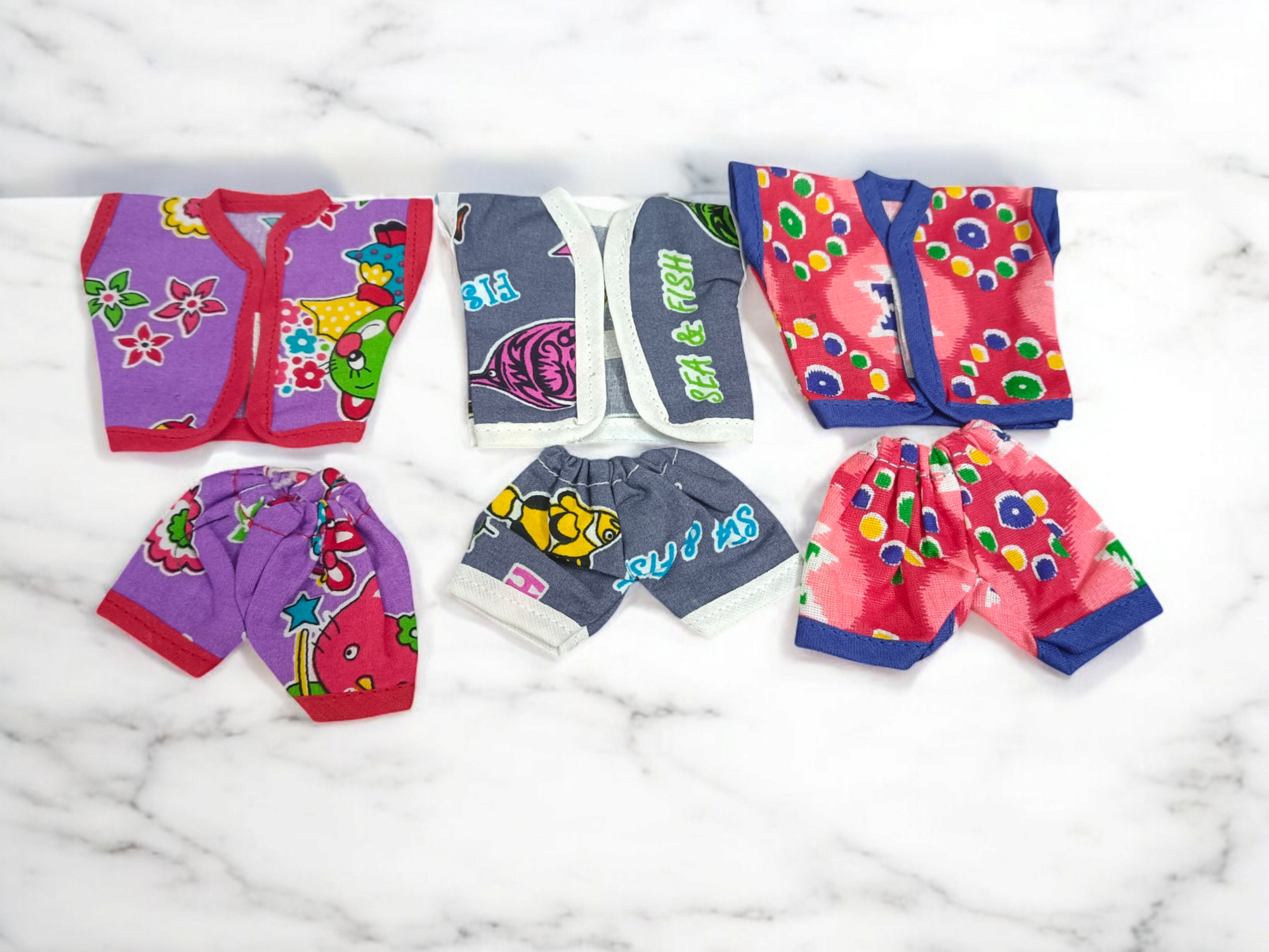 Laddu Gopal Ji dressed in soft cotton night suits, colorful and elegant design