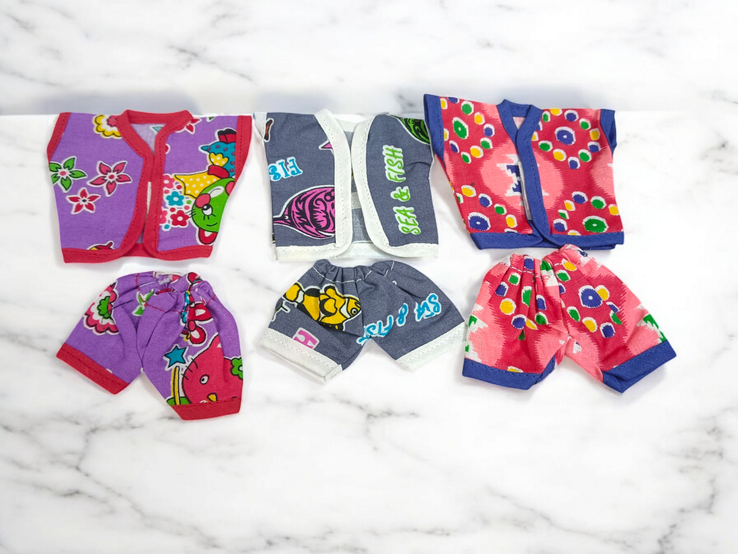 Laddu Gopal Ji dressed in soft cotton night suits, colorful and elegant design