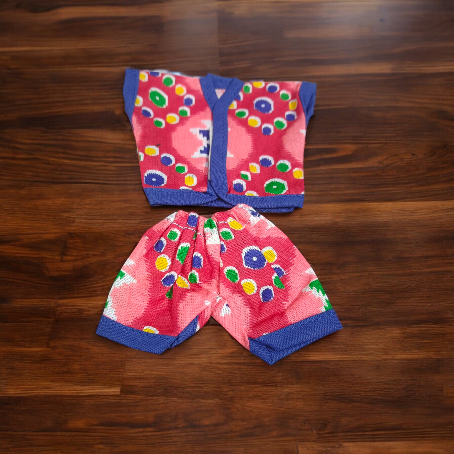 Laddu Gopal Ji dressed in soft cotton night suits, colorful and elegant design