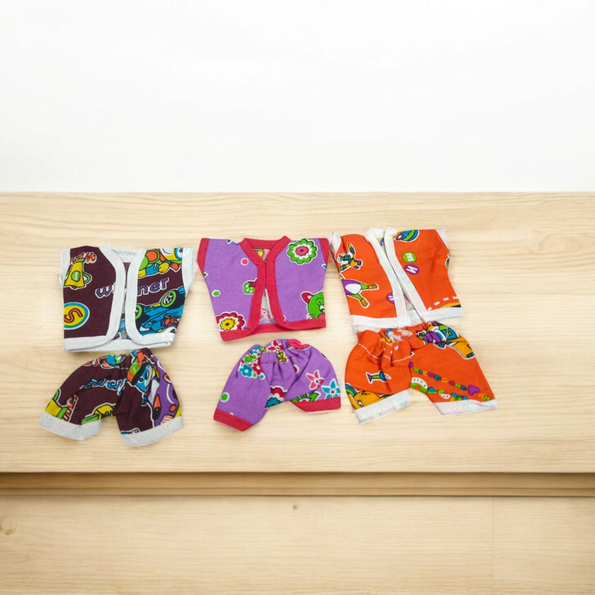 Laddu Gopal Ji dressed in soft cotton night suits, colorful and elegant design