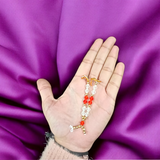 Laddu Gopal Mala made from zircon stones, designed as a small, adjustable garland for adorning Krishna idols and other deity figures, adding divine sparkle and elegance.