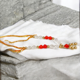 Laddu Gopal Mala made from zircon stones, designed as a small, adjustable garland for adorning Krishna idols and other deity figures, adding divine sparkle and elegance.
