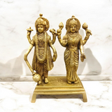 Lakshmi Narayan Standing Pose Pure Brass Idol, intricately crafted with Lord Vishnu and Goddess Lakshmi in a divine standing posture, made from high-quality brass.