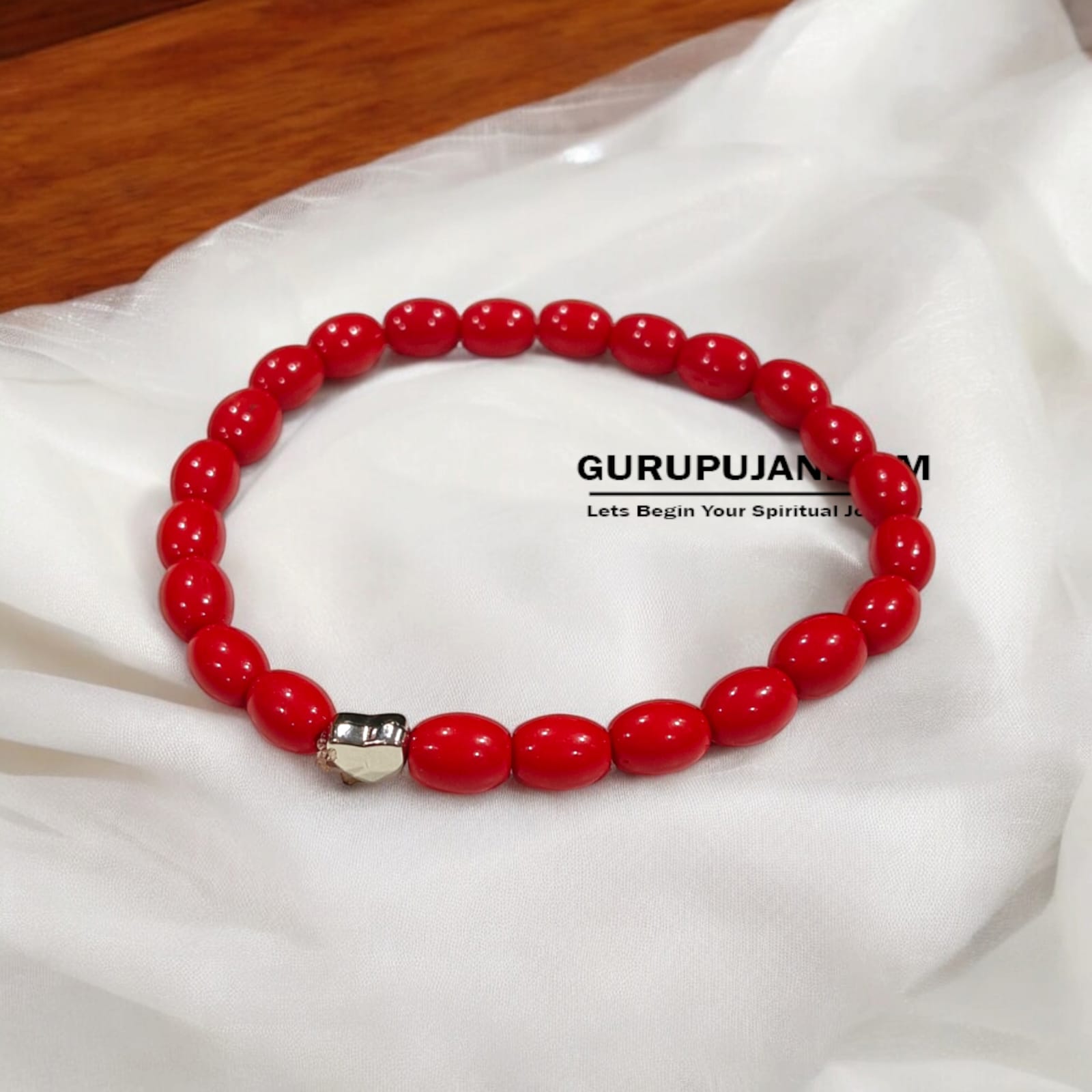 Lal Moonga Bracelet crafted with natural Red Coral beads, 8MM in size, stretchable design, certified for authenticity and courage enhancement.