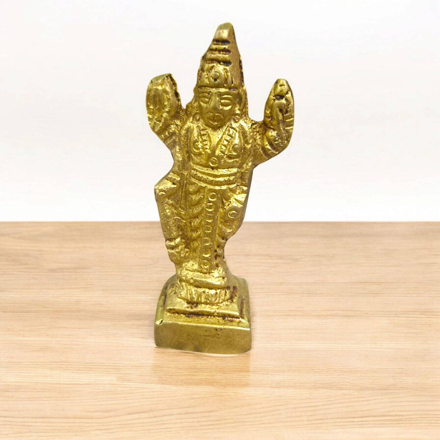 Lord Vishnu Brass Idol standing on a lotus, showcasing intricate details and a divine aura of protection and peace.