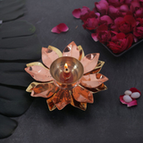 Lotus shaped_Akhand_Jyot_set_of_2_placed_in_a_traditional_temple_setup_used_for_pooja_and_aarti_rituals