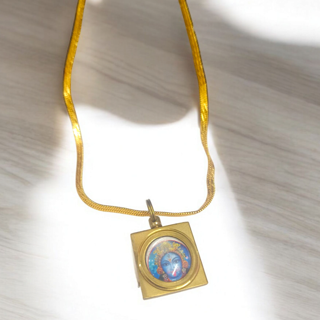 Maa Kali Vashikaran Locket featuring a powerful Vashikaran Yantra design, used for attracting success, protection, and spiritual empowerment.