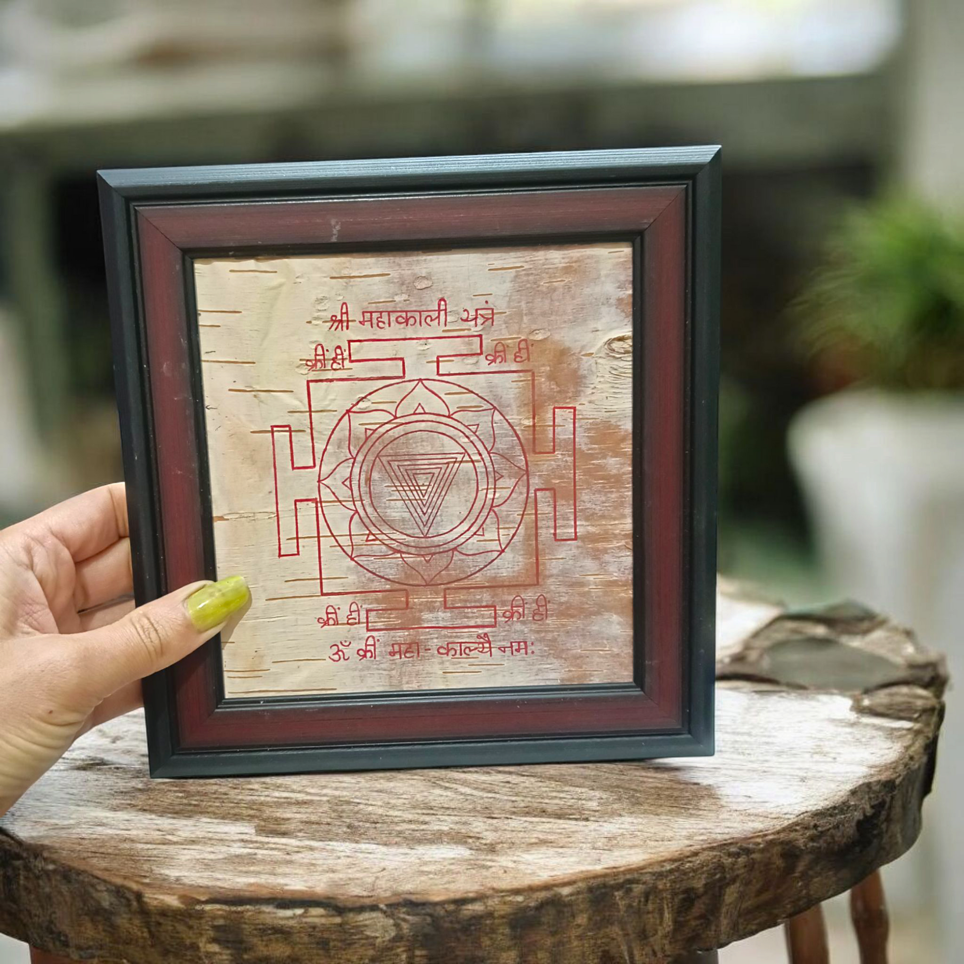Mahakali Yantra inscribed on Bhojpatra, framed in wood, representing Maa Kali’s divine energy, strength, and protection.