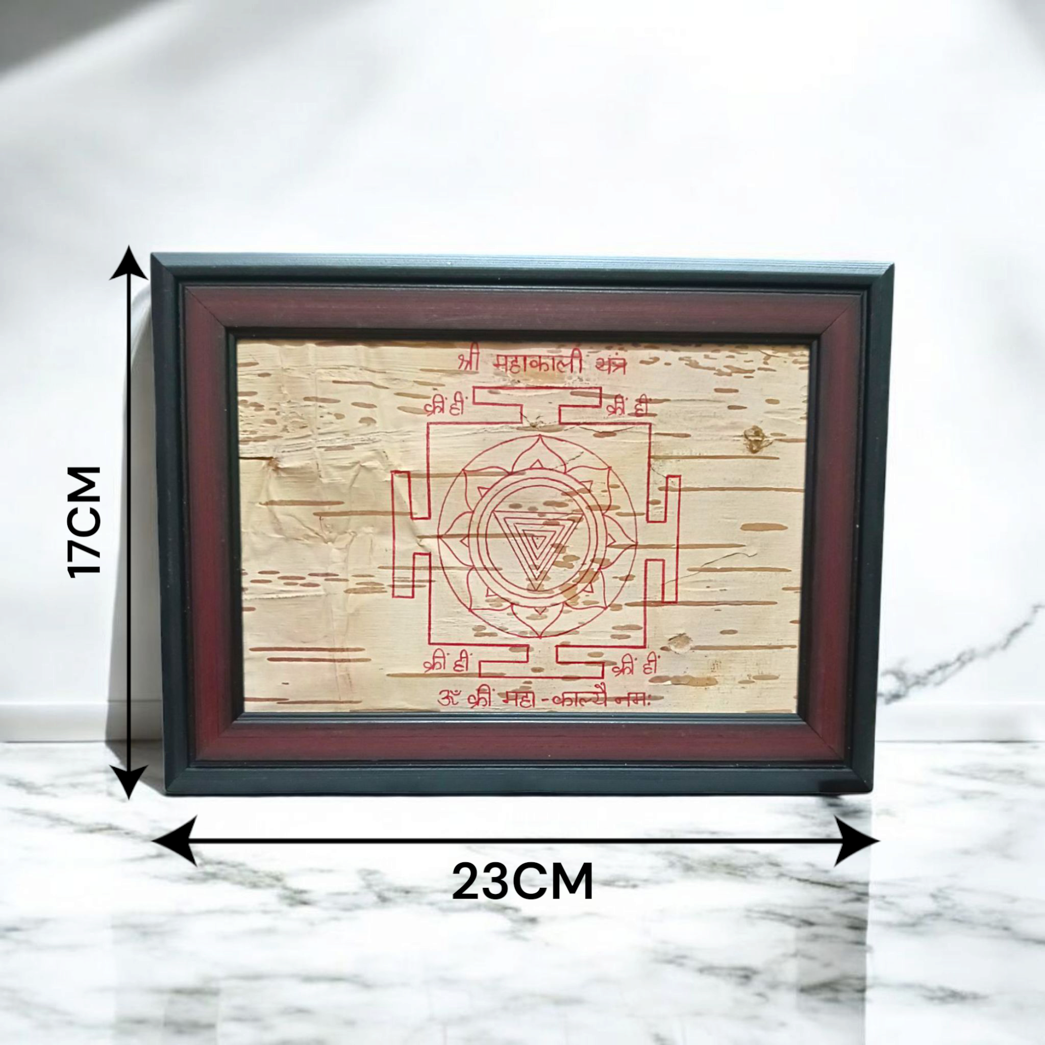 Mahakali Yantra inscribed on Bhojpatra, framed in wood, representing Maa Kali’s divine energy, strength, and protection.
