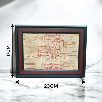 Mahakali Yantra inscribed on Bhojpatra, framed in wood, representing Maa Kali’s divine energy, strength, and protection.
