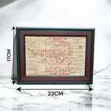 Mahakali Yantra inscribed on Bhojpatra, framed in wood, representing Maa Kali’s divine energy, strength, and protection.
