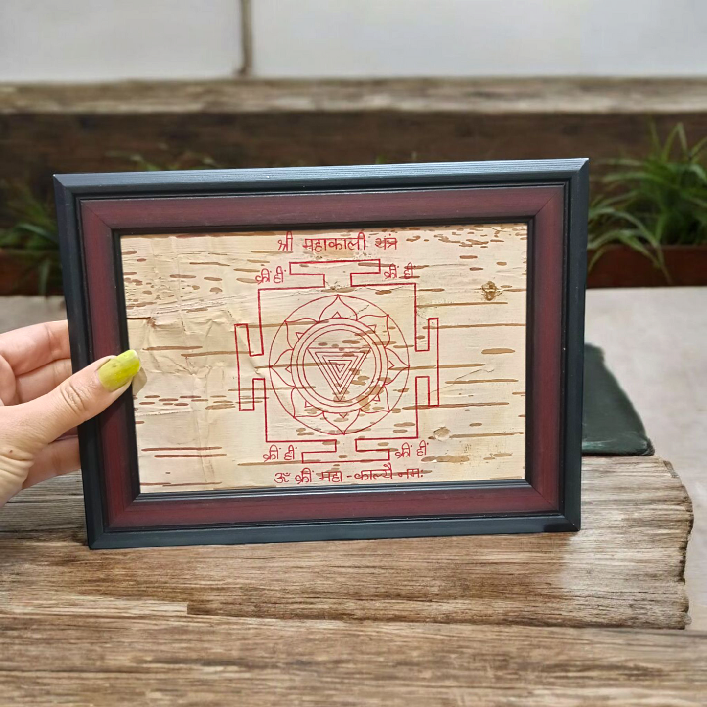 Mahakali Yantra inscribed on Bhojpatra, framed in wood, representing Maa Kali’s divine energy, strength, and protection.