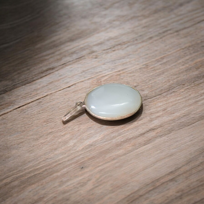 Moonstone Pendant with Adjustable Thread, a natural milky moonstone known for its healing properties and emotional balance