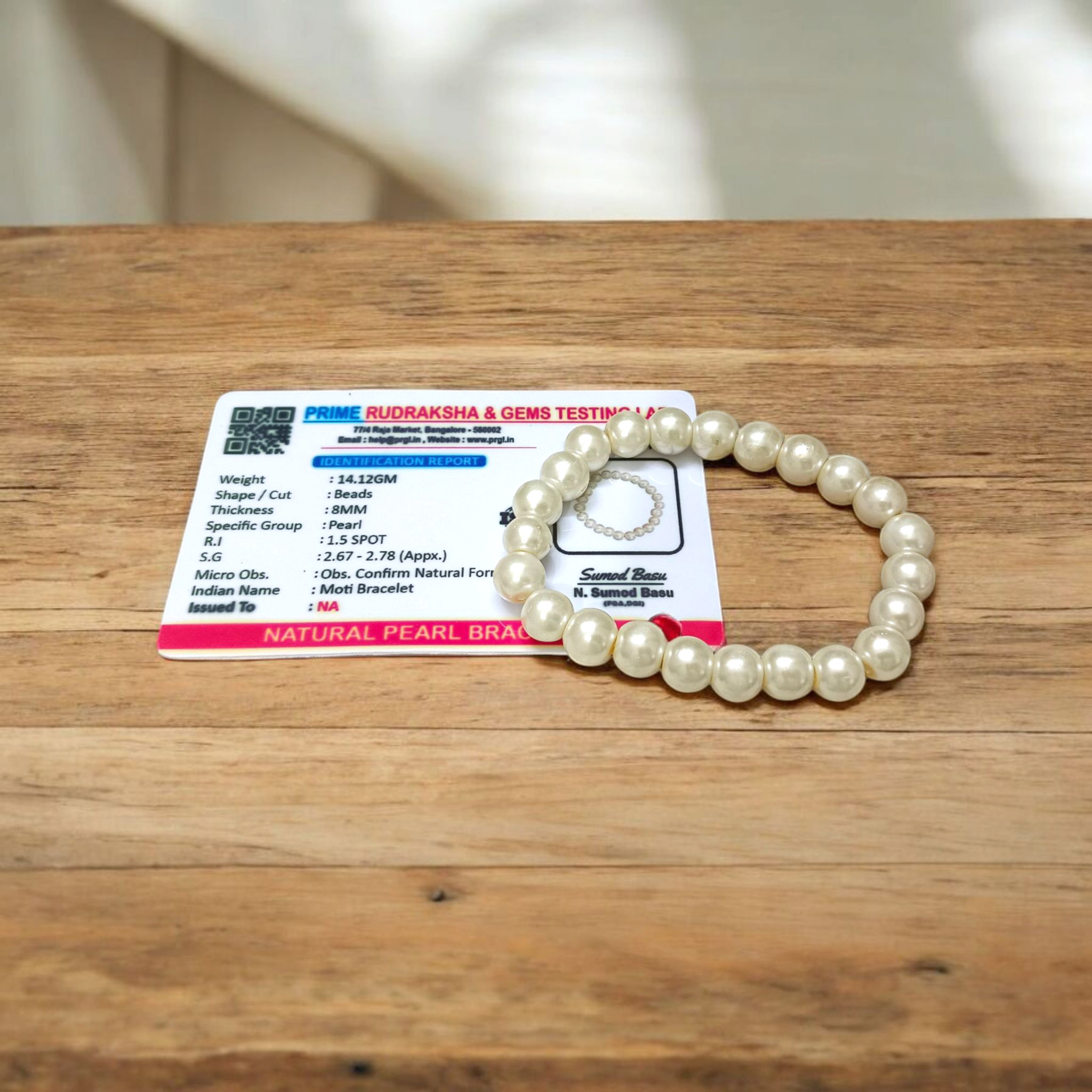 Moti Bracelet with 8MM smooth, natural pearl beads, stretchable design with certificate, promoting inner peace and emotional balance.