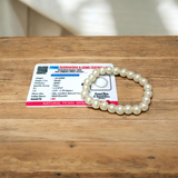 Moti Bracelet with 8MM smooth, natural pearl beads, stretchable design with certificate, promoting inner peace and emotional balance.