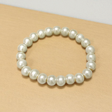 Moti Bracelet with 8MM smooth, natural pearl beads, stretchable design with certificate, promoting inner peace and emotional balance.