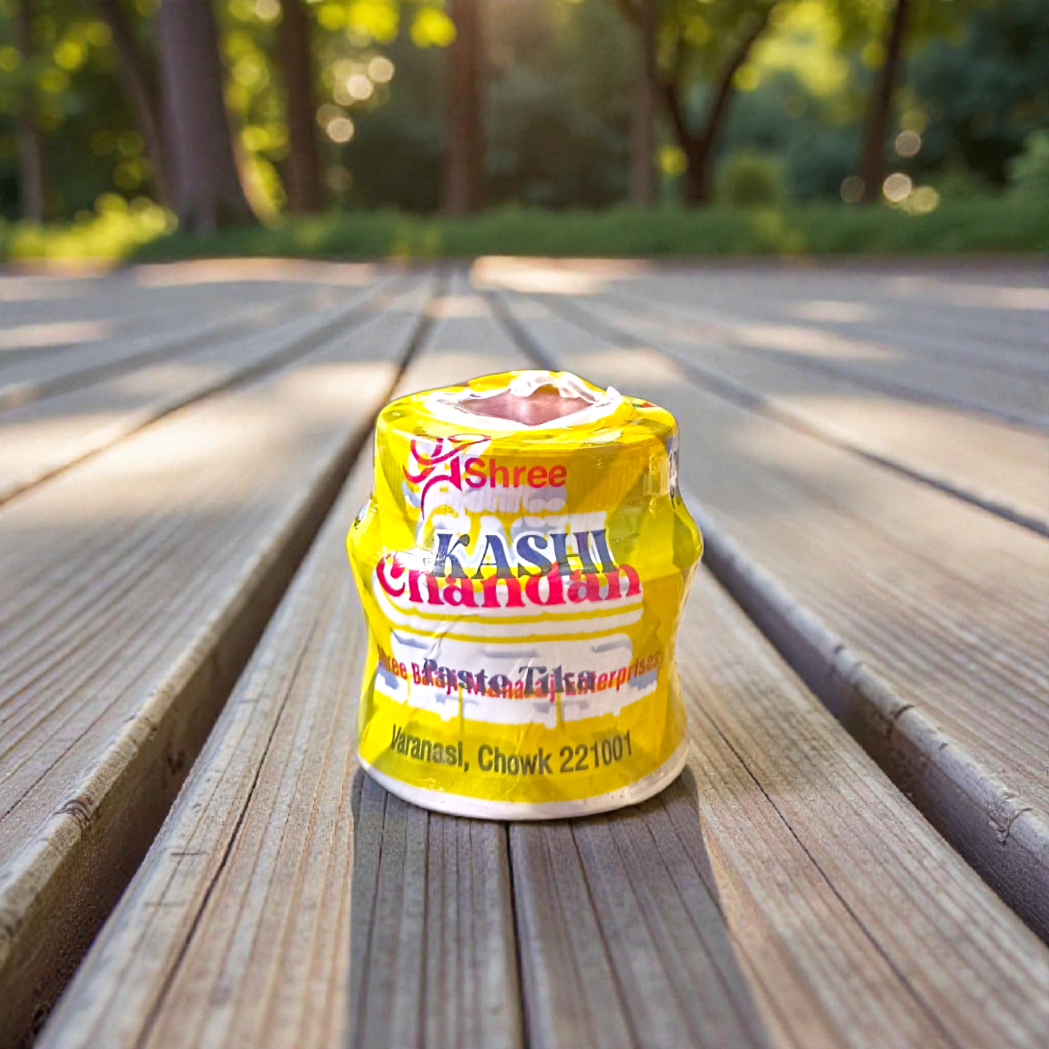 Multi-colored chandan paste tika containers in Yellow, Red, and White with keshar fragrance