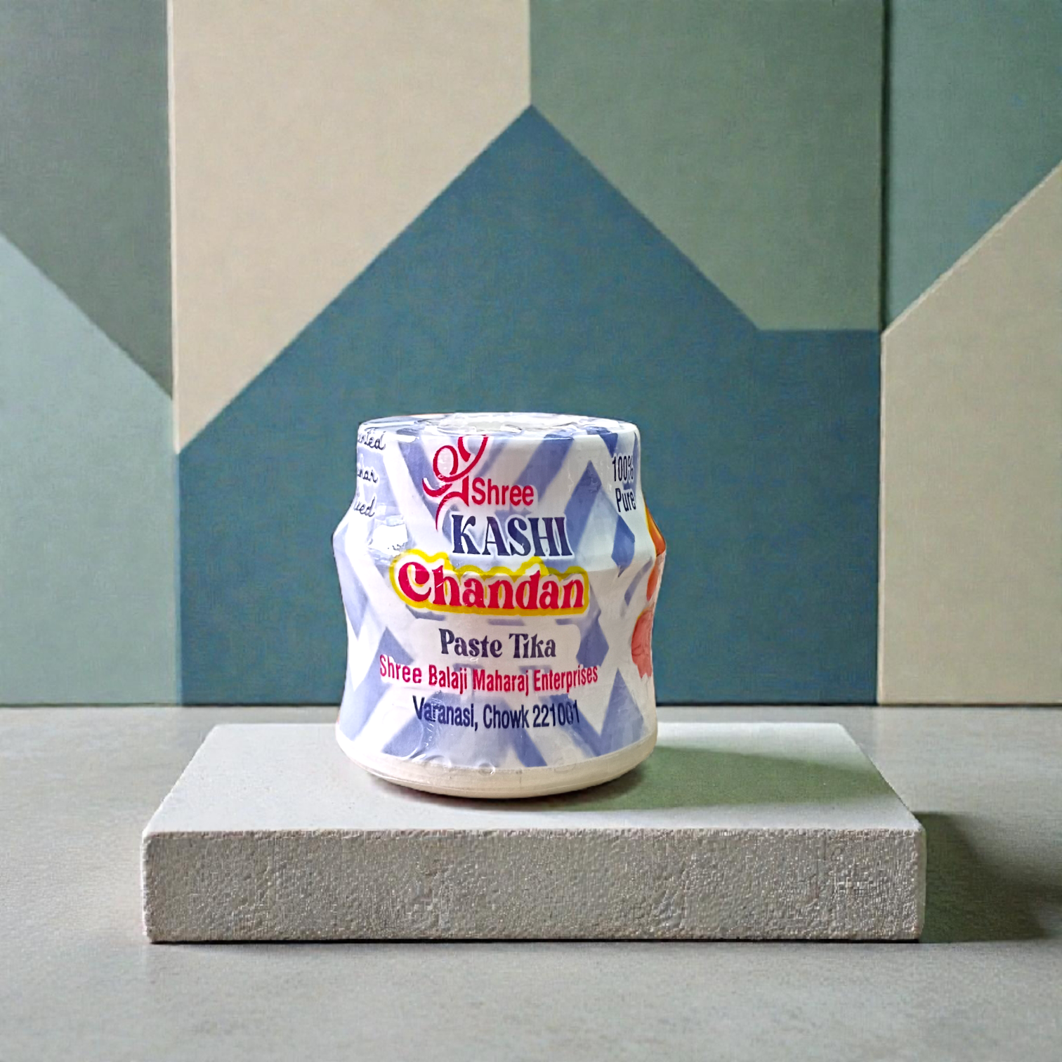 Multi-colored chandan paste tika containers in Yellow, Red, and White with keshar fragrance