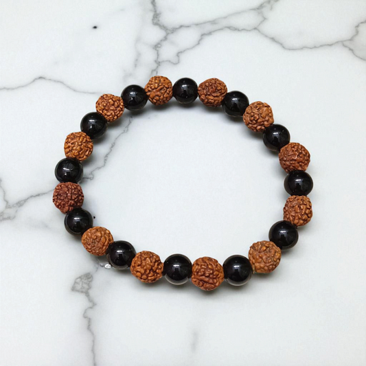 Natural Agate and 5 Mukhi Rudraksha Bracelet with 8mm black and brown beads on stretchable thread, lab certified, displayed on a natural stone background