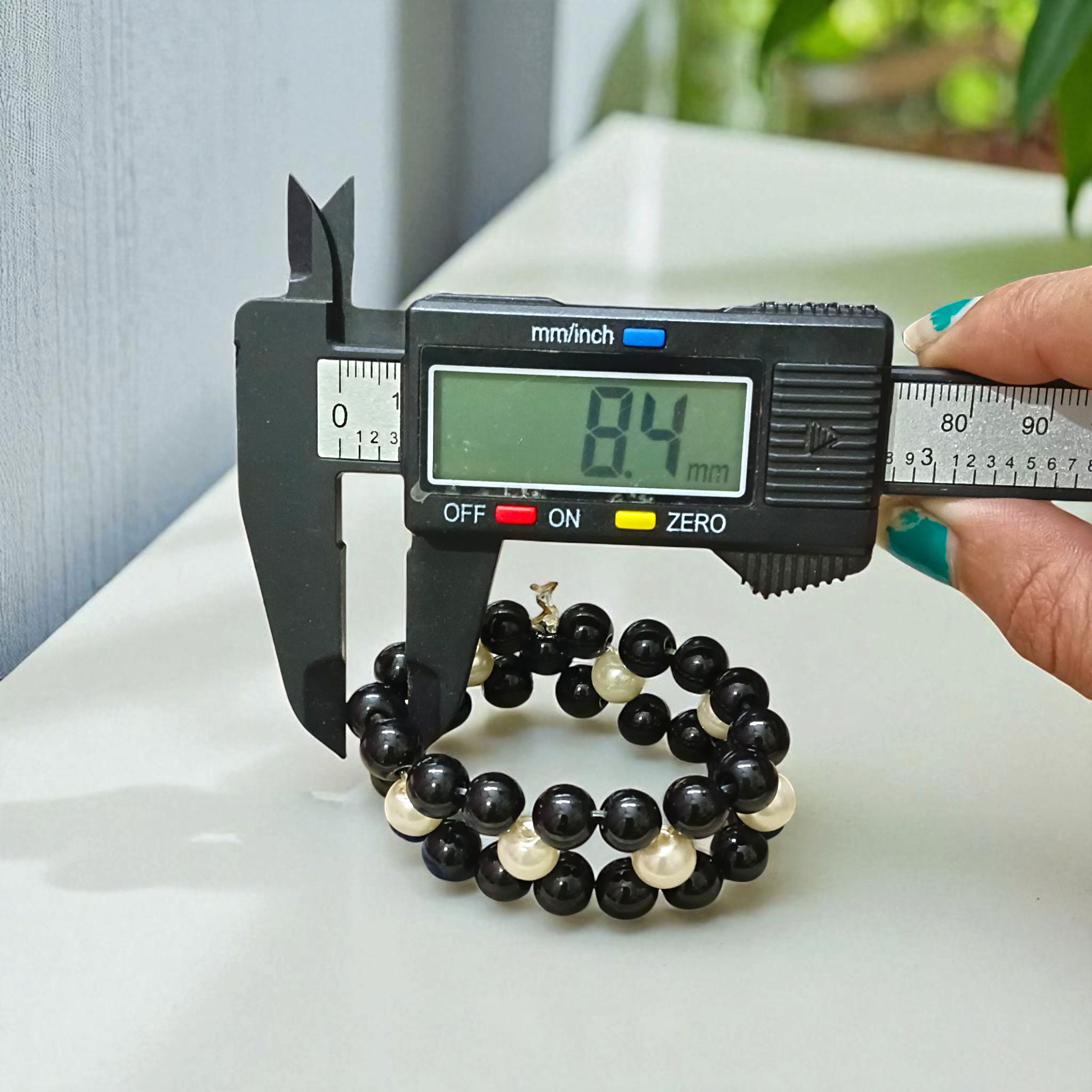 Natural Black Agate and Pearl bracelet with polished round beads, elastic thread, spiritual and stylish design for protection and attraction