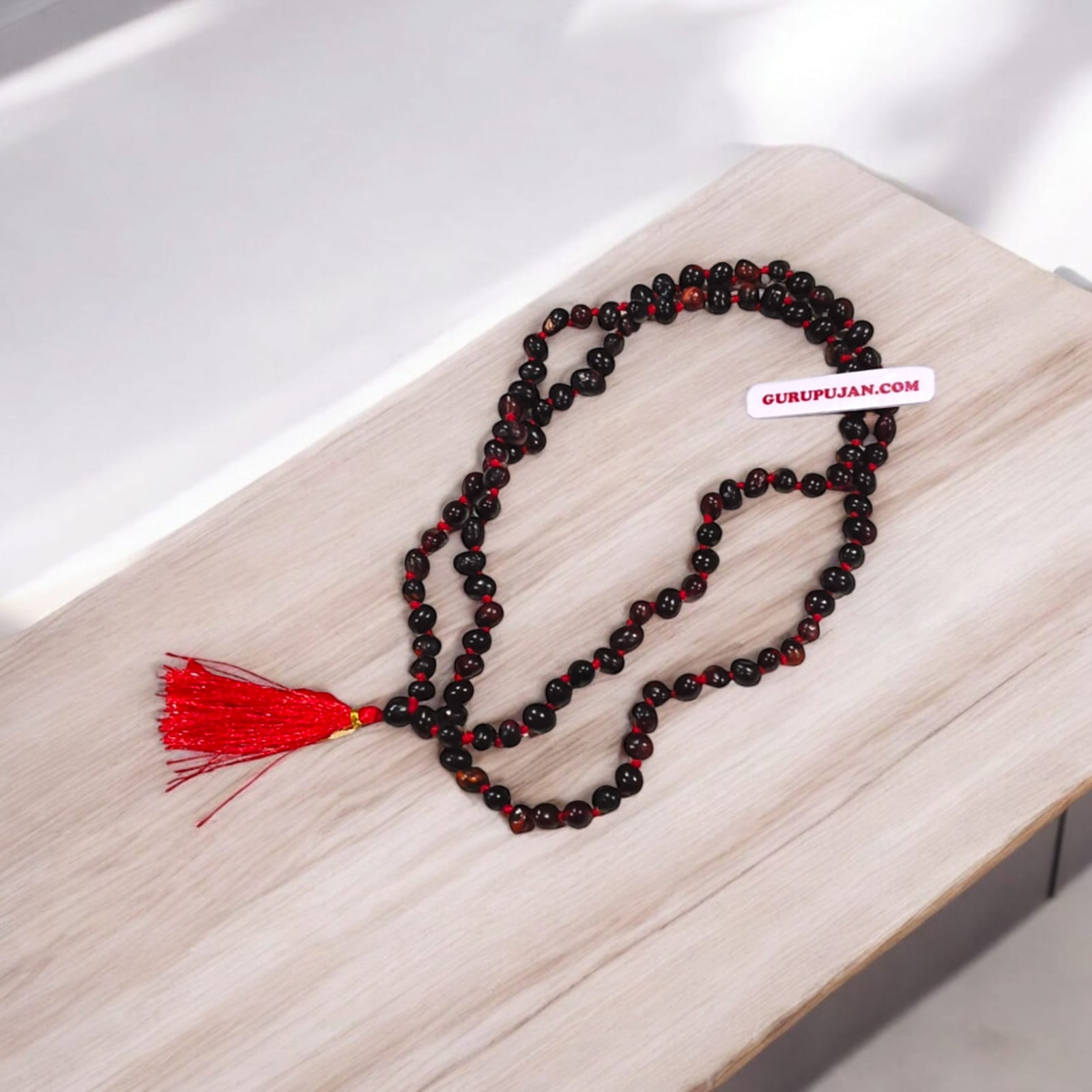 Natural Black Gunja Mala made from premium black Chirmi beads, ideal for protection against evil eye and enhancing power, available in various formats