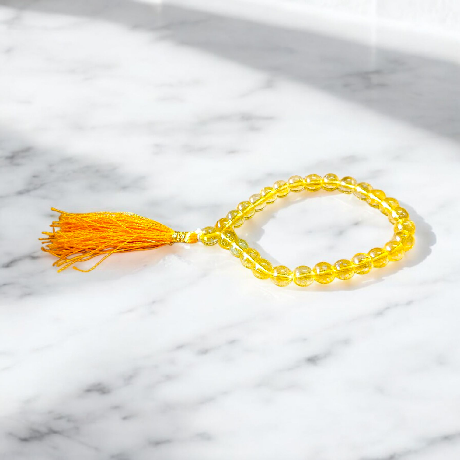 Natural Citrine Mala with 27+1 round 8mm beads, ideal for spiritual japa meditation, chanting, and manifestation practices