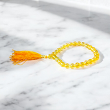 Natural Citrine Mala with 27+1 round 8mm beads, ideal for spiritual japa meditation, chanting, and manifestation practices
