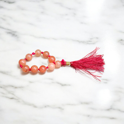 Natural Hessonite Finger Mala featuring 9+1 smooth 8mm Gomed beads, lab-certified gemstone mala for protection, clarity, and Rahu remedies