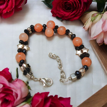 Natural Hessonite (Gomed) bracelet with 8mm round beads, stretchable and lab certified—used for mental clarity, Rahu balance, and spiritual healing