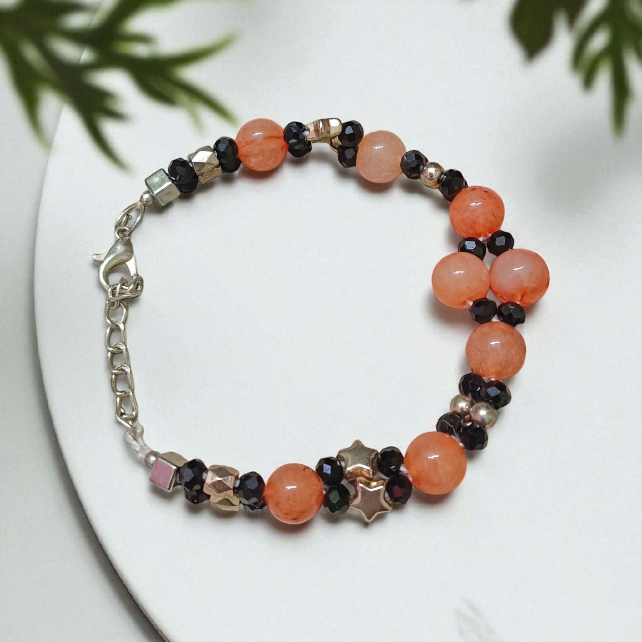 Natural Hessonite (Gomed) bracelet with 8mm round beads, stretchable and lab certified—used for mental clarity, Rahu balance, and spiritual healing