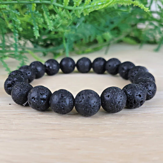 Natural Lava Stone Bracelet with 8MM lab-certified beads, stretchable design for grounding, calming, and aromatherapy benefits.