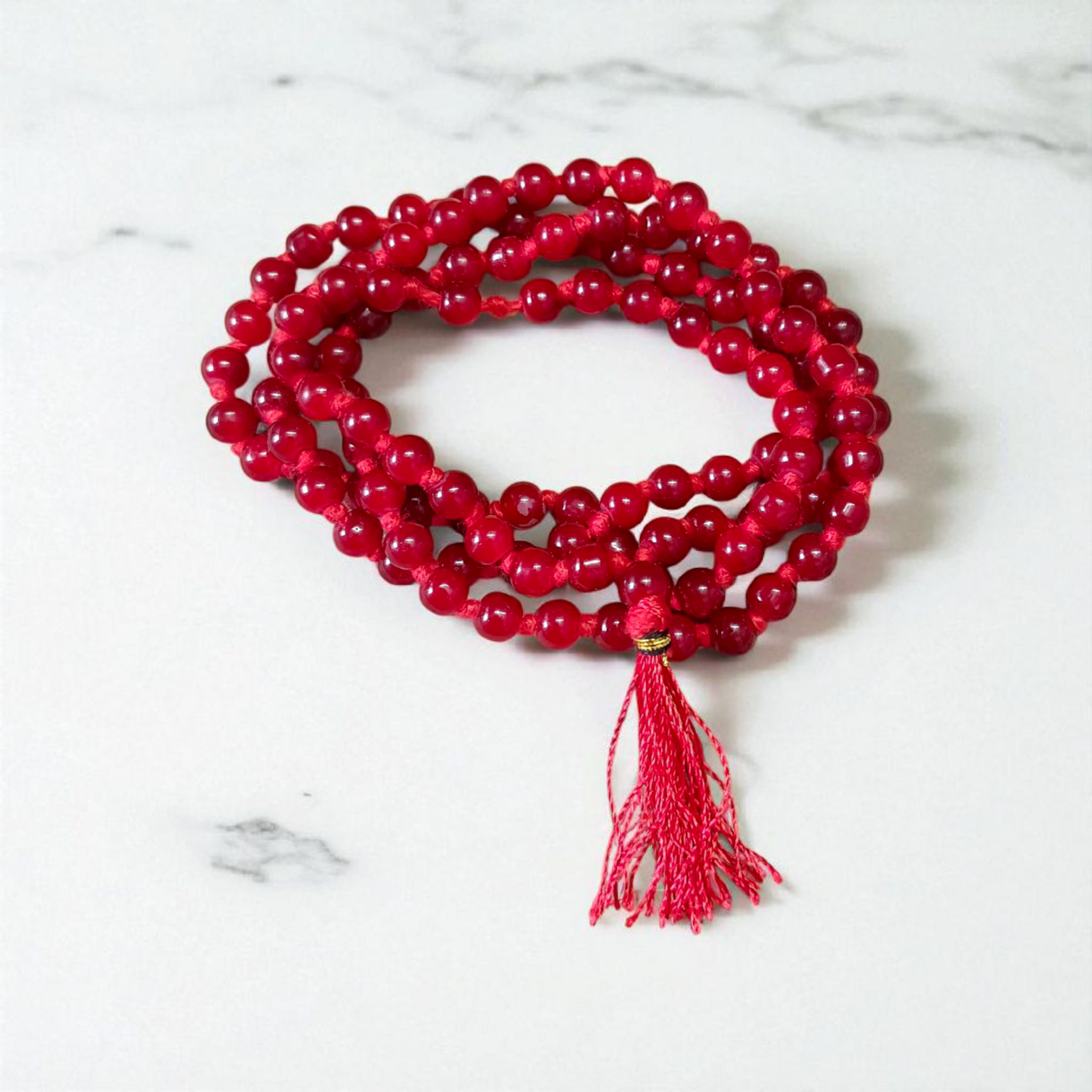 Natural Red Agate Mala made with 108+1 deep red polished 6mm beads, ideal for chanting and spiritual wear